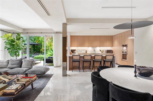 dining room featuring sink