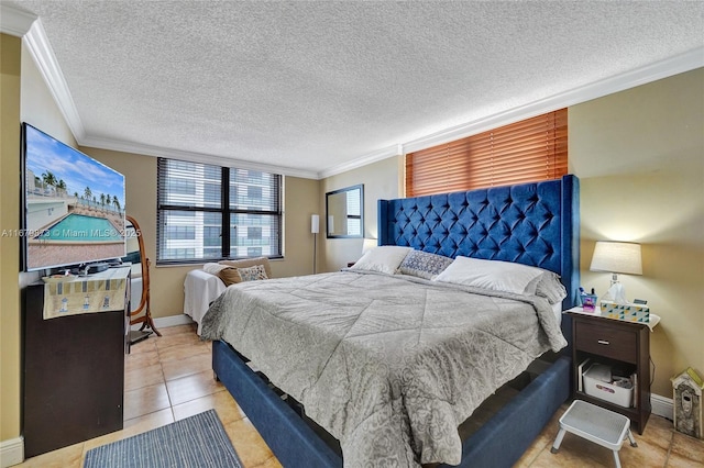 bedroom featuring a textured ceiling and crown molding