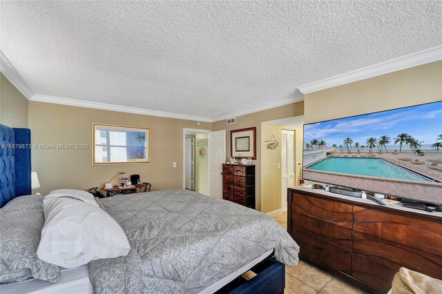 bedroom with crown molding and a textured ceiling