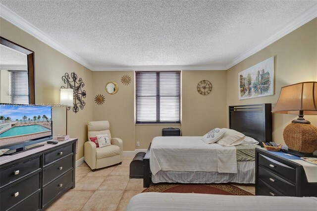 tiled bedroom featuring a textured ceiling and ornamental molding