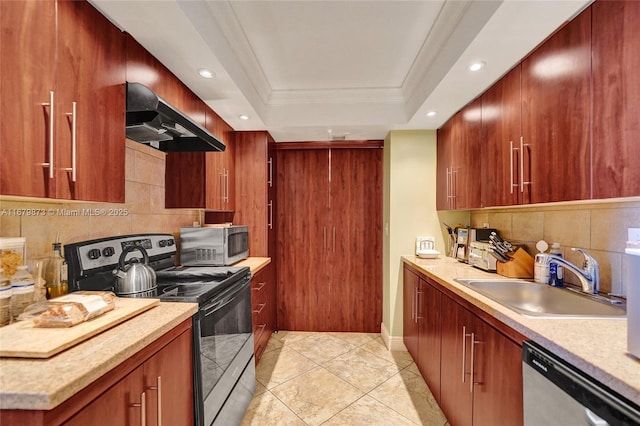 kitchen featuring tasteful backsplash, stainless steel appliances, extractor fan, a raised ceiling, and sink