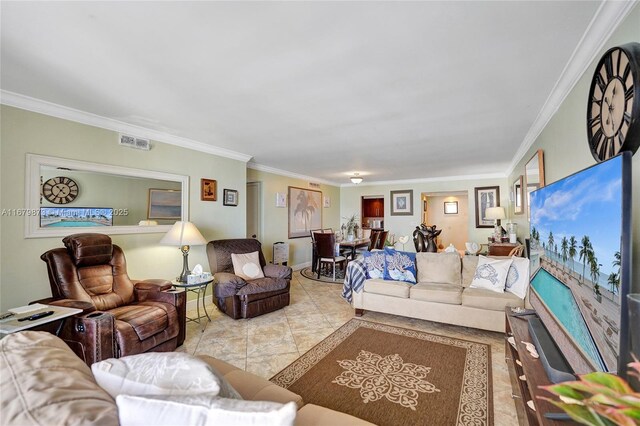 living room featuring ornamental molding and light tile patterned floors