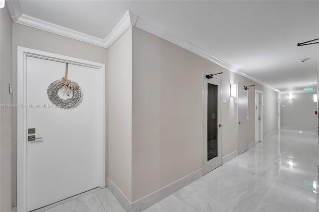 corridor featuring crown molding