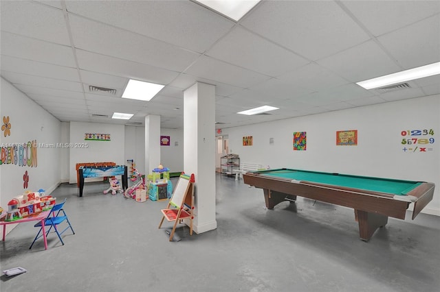 game room featuring a drop ceiling, pool table, and concrete floors