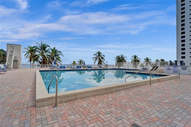 view of pool featuring a patio