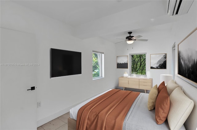 tiled bedroom with ceiling fan