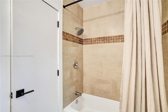 bathroom featuring shower / bath combination with curtain