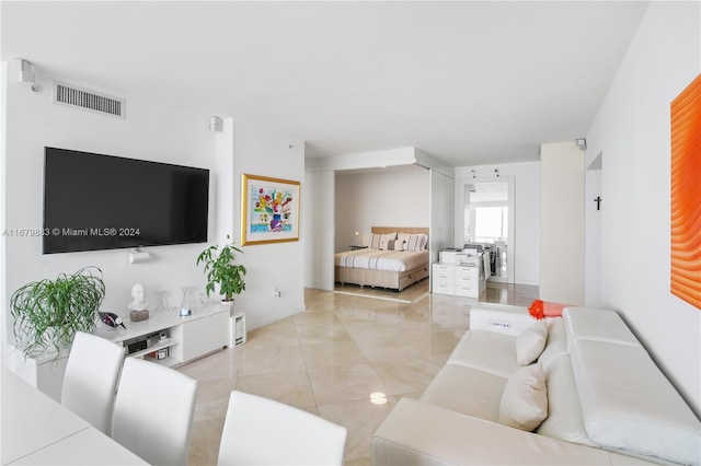 living room featuring light tile patterned flooring