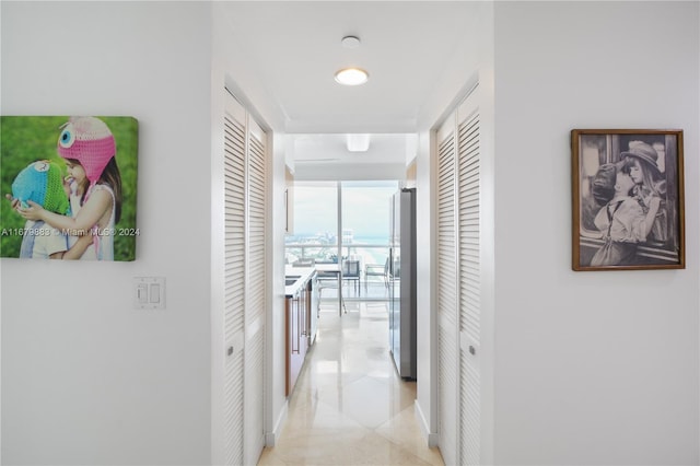 hallway with expansive windows