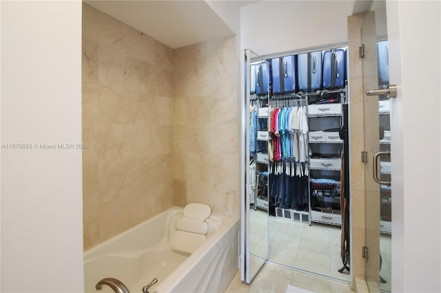 bathroom featuring separate shower and tub and tile patterned flooring