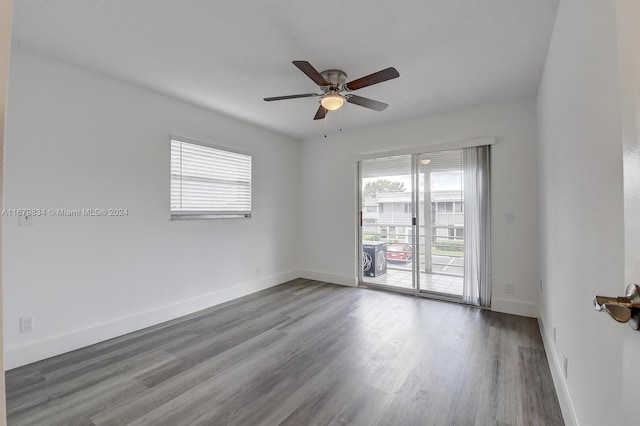 unfurnished room featuring ceiling fan and wood-type flooring