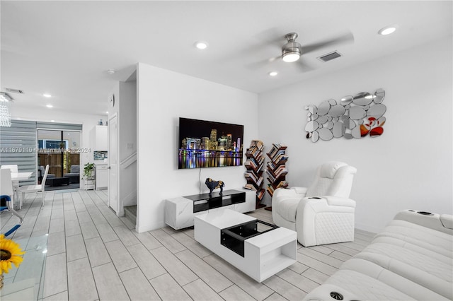 living room featuring ceiling fan