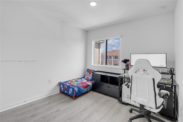 home office featuring light hardwood / wood-style floors