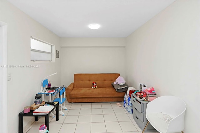 living area featuring light tile patterned floors