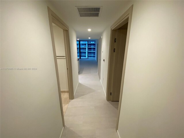 1000 Brickell Plz Unit 2907, Miami, FL 33131 - hallway featuring baseboards