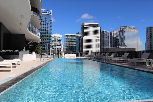 1000 Brickell Plz Unit 2907, Miami, FL 33131 - community pool featuring a view of skyline and a patio area