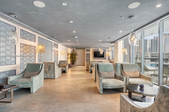 1000 Brickell Plz Unit 2907, Miami, FL 33131 - building lobby featuring floor to ceiling windows and recessed lighting