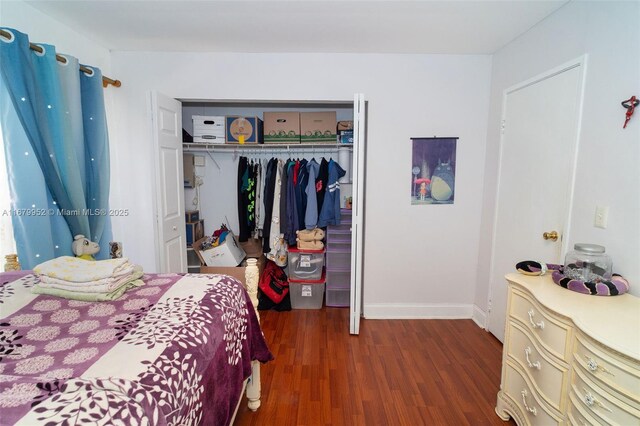 bedroom featuring dark hardwood / wood-style floors