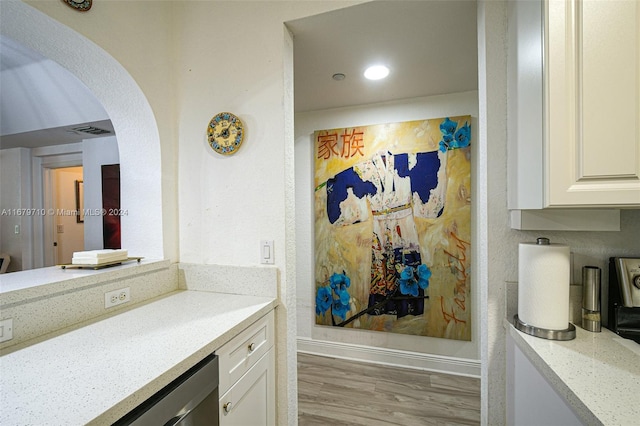 bathroom featuring vanity and hardwood / wood-style flooring