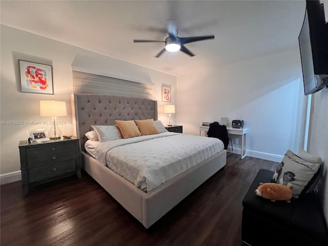 bedroom featuring ceiling fan and dark hardwood / wood-style flooring