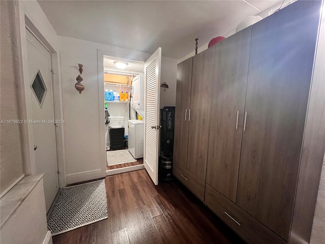 interior space featuring washer / clothes dryer and dark hardwood / wood-style flooring