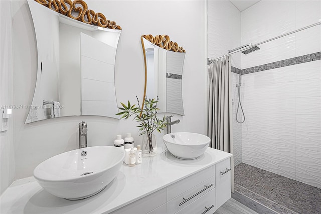 bathroom with vanity, hardwood / wood-style floors, and a shower with curtain