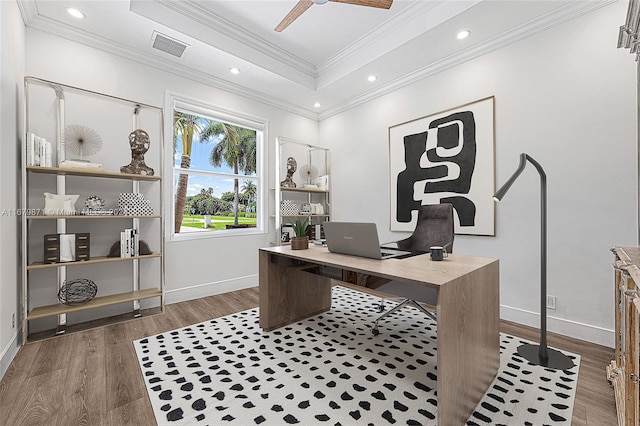 office with ornamental molding, dark hardwood / wood-style floors, and ceiling fan