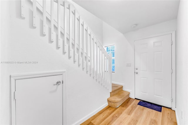 entrance foyer featuring hardwood / wood-style floors