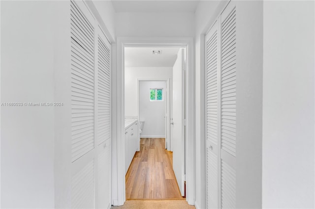 hallway featuring light hardwood / wood-style floors