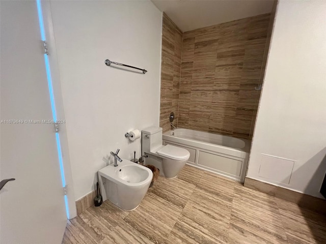 bathroom featuring wood-type flooring, a bidet, toilet, and shower / bath combination