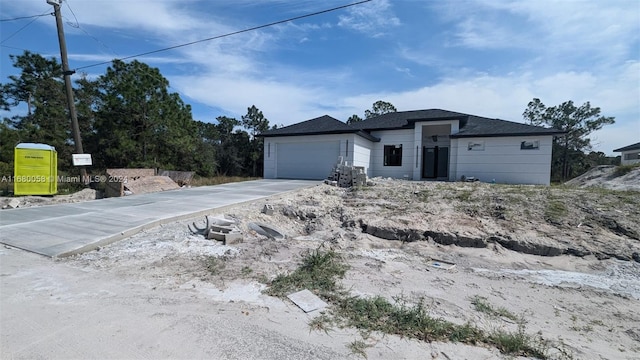 view of front of house with a garage