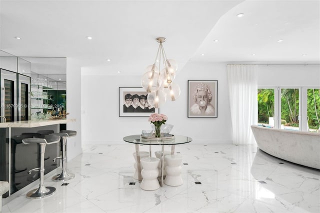 dining space with a chandelier