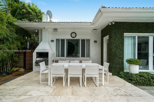 view of patio / terrace featuring a grill