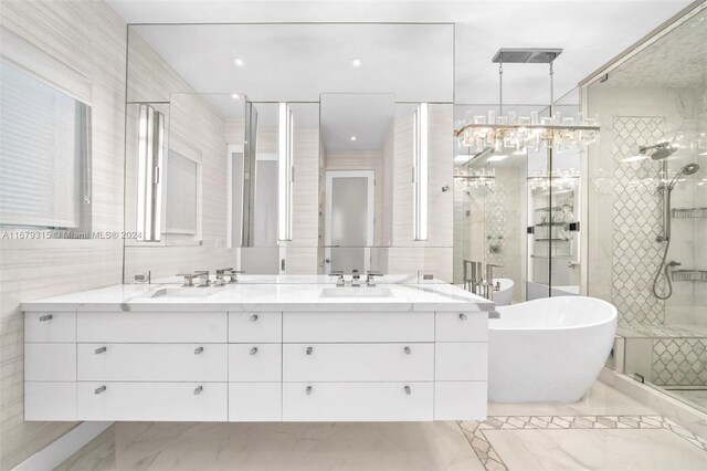 bathroom featuring tile walls, vanity, and shower with separate bathtub