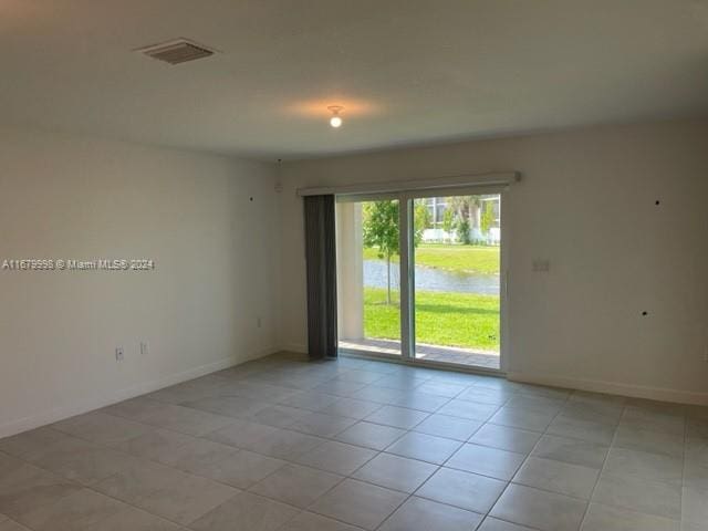 view of tiled empty room