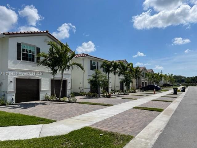 view of front of home with a garage