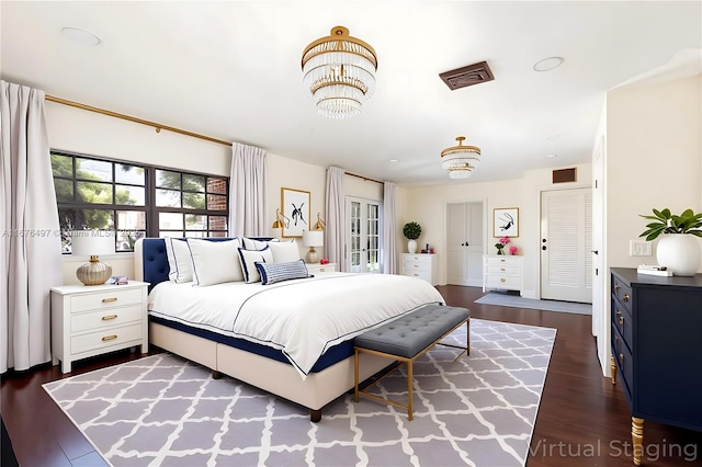 2616 Acacia Ct, Fort Lauderdale, FL 33301 - bedroom featuring dark wood-type flooring and a chandelier