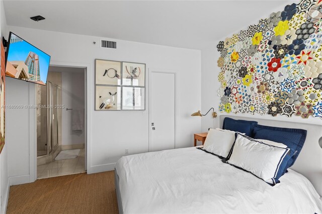 300 S Pointe Dr Unit 3204, Miami Beach, FL 33139 - tiled bedroom featuring carpet floors and ensuite bathroom