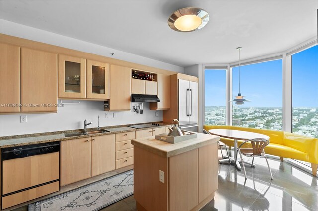 300 S Pointe Dr Unit 3204, Miami Beach, FL 33139 - kitchen featuring dishwasher, a sink, light brown cabinets, under cabinet range hood, and black electric cooktop