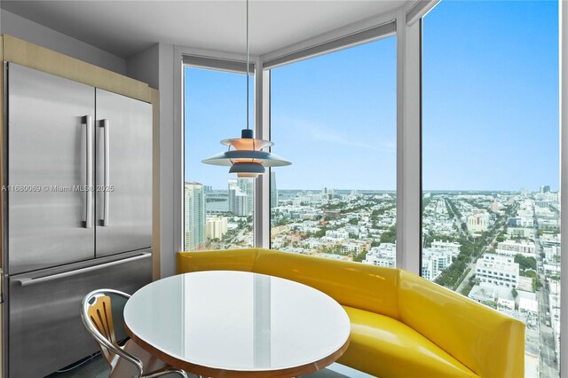 300 S Pointe Dr Unit 3204, Miami Beach, FL 33139 - dining room featuring a view of city and expansive windows