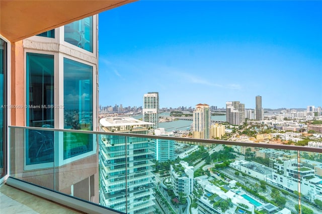 balcony featuring a water view