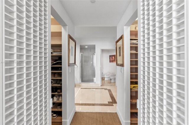300 S Pointe Dr Unit 3204, Miami Beach, FL 33139 - corridor with tile patterned flooring and baseboards