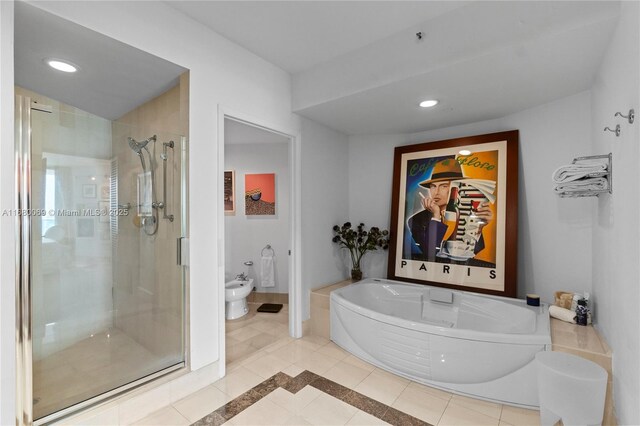 300 S Pointe Dr Unit 3204, Miami Beach, FL 33139 - full bathroom featuring a bidet, a shower stall, a bath, tile patterned floors, and recessed lighting