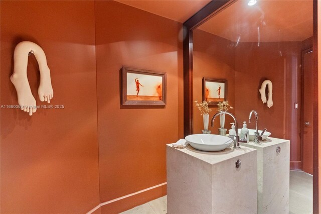 300 S Pointe Dr Unit 3204, Miami Beach, FL 33139 - bathroom with vanity and baseboards
