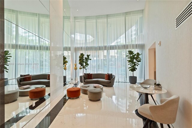 300 S Pointe Dr Unit 3204, Miami Beach, FL 33139 - building lobby featuring a high ceiling