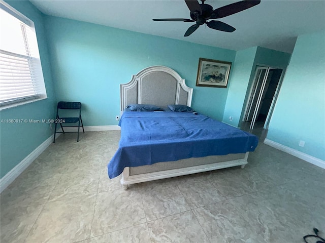 bedroom featuring ceiling fan