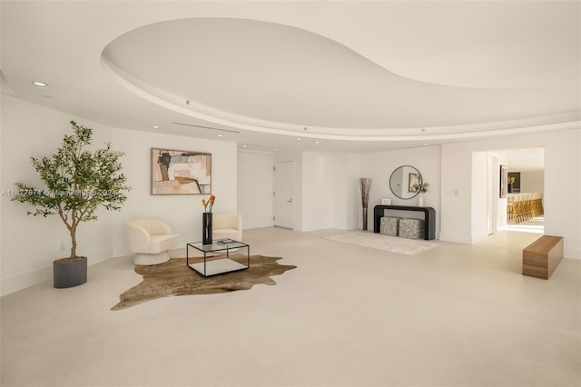 living room with a raised ceiling