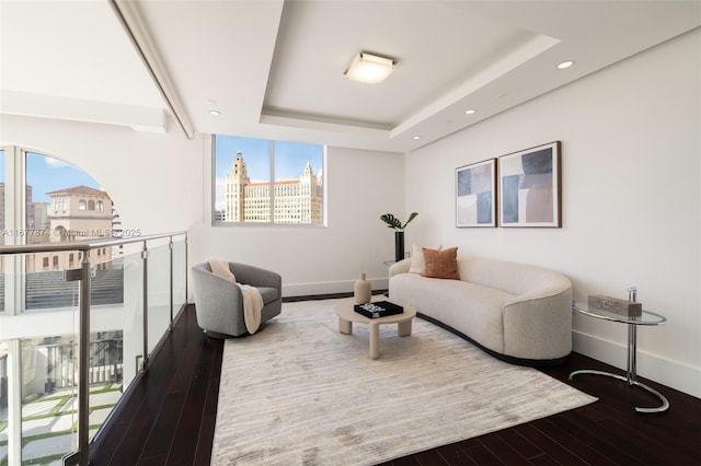 55 Merrick Way Unit 808, Coral Gables, FL 33134 - living room featuring baseboards, hardwood / wood-style floors, a raised ceiling, and recessed lighting