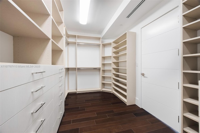 55 Merrick Way Unit 808, Coral Gables, FL 33134 - spacious closet with dark wood-style floors