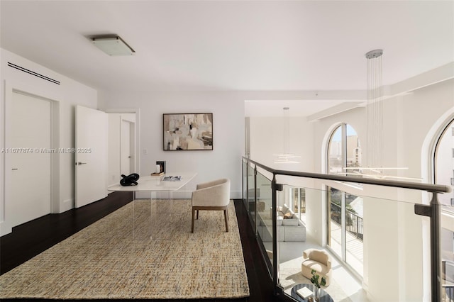 55 Merrick Way Unit 808, Coral Gables, FL 33134 - corridor with wood finished floors and an upstairs landing